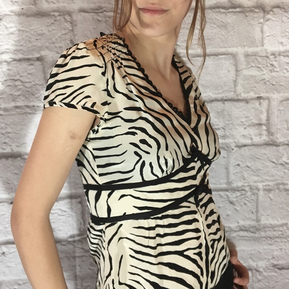 Nanette Lepore 100% silk zebra print top.